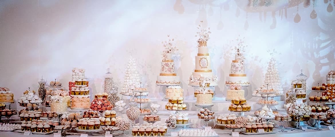 Peach and Cream Dessert Table with Cupcakes, Macarons, Meringues, Cookies and Tiered Cakes with Peach Sugar Flowers and Butterflies for a Royal Wedding in Qatar, by Rosalind Miller Cakes, London